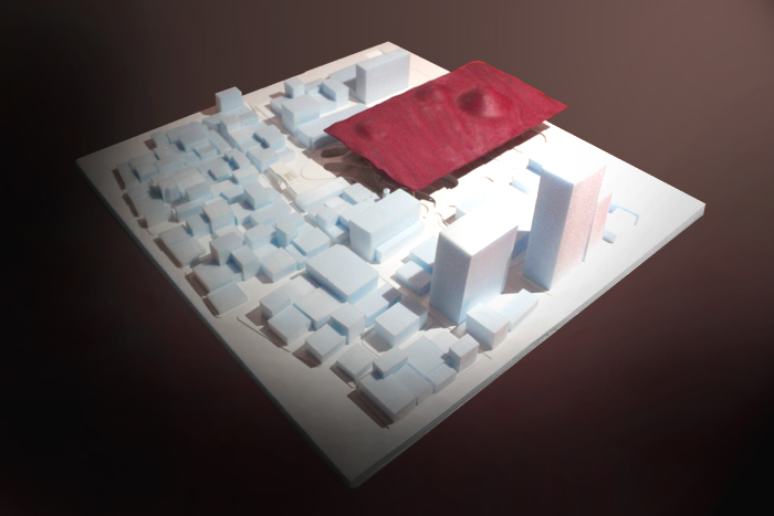 <div style=color:#000>Location:Al-Bahrain
              &nbspYear:2012</div>
	The proposal aims to activate the square as a vibrant city center, symbolizing Bahrain’s history, heritage and modernity collectively, and to allow it to act as an integral part of everyday urban life. This unique sense of place is achieved by attracting the public of all ages, improving communication and social exchange amongst the users, and by creating a flexible multi-use space able to host numerous cultural and social activities and events. It will be a space that is responsive to its changing setting, manipulating the way in which it is perceived and interacted with. 
Bahrain’s political protesting (post-lulu square demolition) remains largely nomadic and changeable, moving and mutating quickly, heavily dependent on real-time information transfer. Social networking and smart phone real-time information transfer also endorsed the Arab spring and provided an answer to the complex situation of continuous fluctuations. 
 At the center of our proposition was the interest in spaces which make invisible processes visible. We’ve established a logistical communication network between the square and other locations in Bahrain, through sound input nodes dispersed in major political (protest), cultural and recreational locations, as well as in several seafront locations. Sound inputs (frequency, volume..etc.) are translated into hot air/smoke streams emitting from 11 giant pillars in the square, inducing the movement of a thin fabric hanging canopy by utilizing air buoyancy and pressure.  Projections of social media feeds, real-time streaming coverage of events are displayed on the pillars accentuating a parallel atmosphere in the square. As events and happenings develop, mutate, move, the square responds accordingly in different ways, turning far invisible activities into visible signals, linking remote locations and happenings together and bringing Bahrain into its square.
On the ground floor level, the project proposes a topography of continuously unfolding, undulating surfaces enclosing a sequence of spaces. This ground ‘topography’ not only acts as a network of circulation elements, but also contributes significantly to the character of the space. It provides functional and programmatic possibilities with its sloping surfaces, and creates enclosures for both intimate and larger gatherings. These include day market, vending, art exhibitions and installations, music concerts, carnivals, religious festivals and movie screenings as well as protesting, meeting friends, relaxing, biking and skating.
